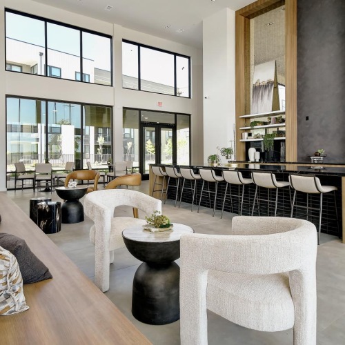 a large room with a large table and chairs